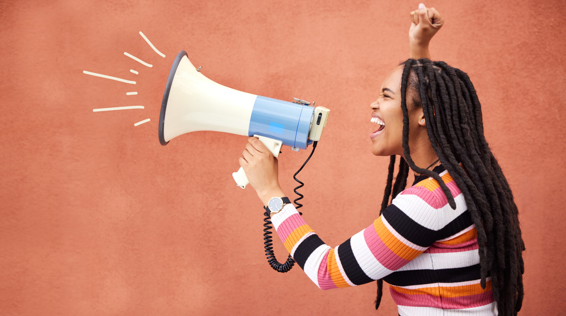 Black Feminism 1 A black woman holding a megaphone and shouting into it