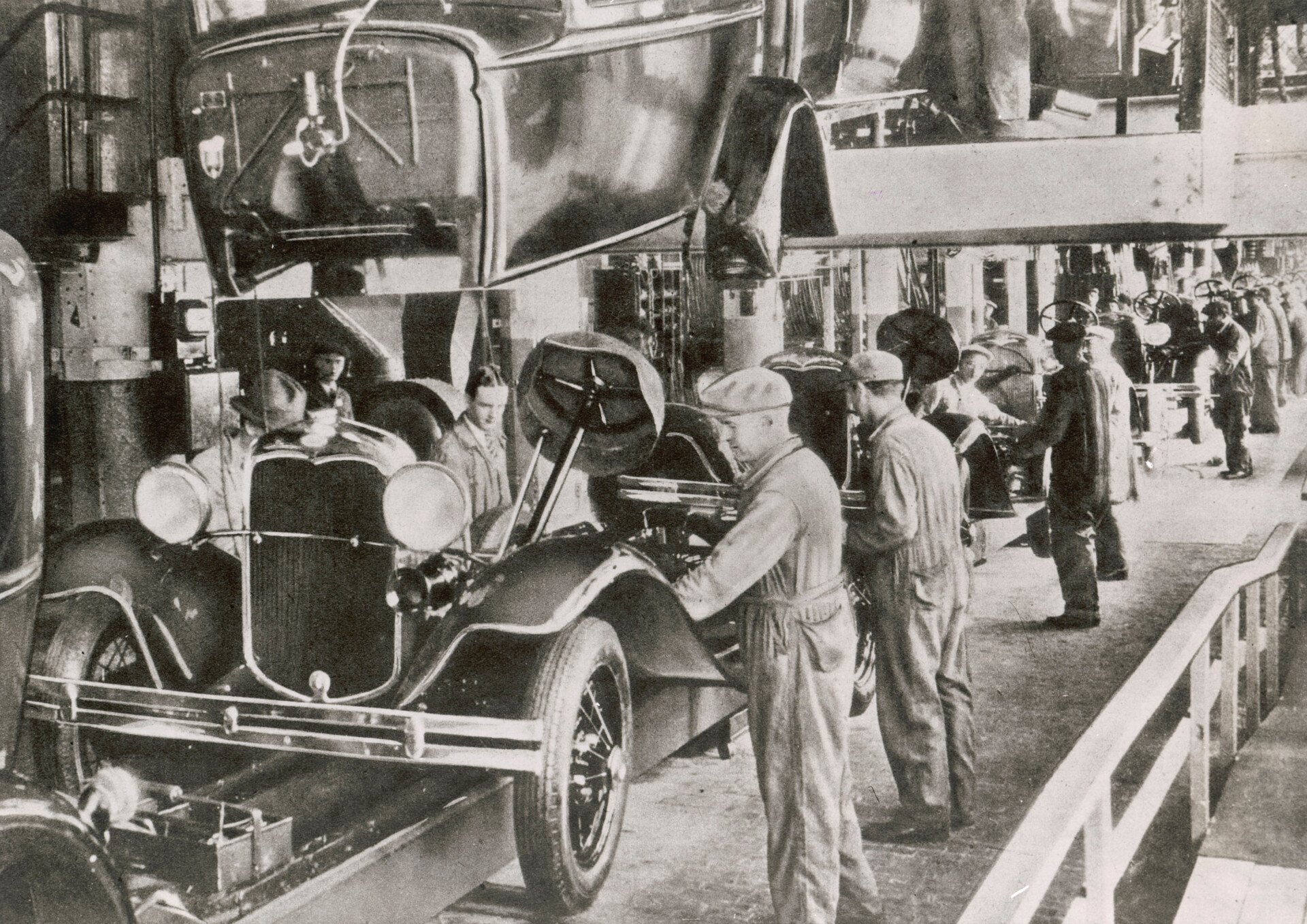 Division of Labor 1 Photo of a Ford car Assembly Line circa 1929