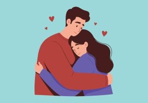 A man and a woman embracing, happy, with love hearts around them.