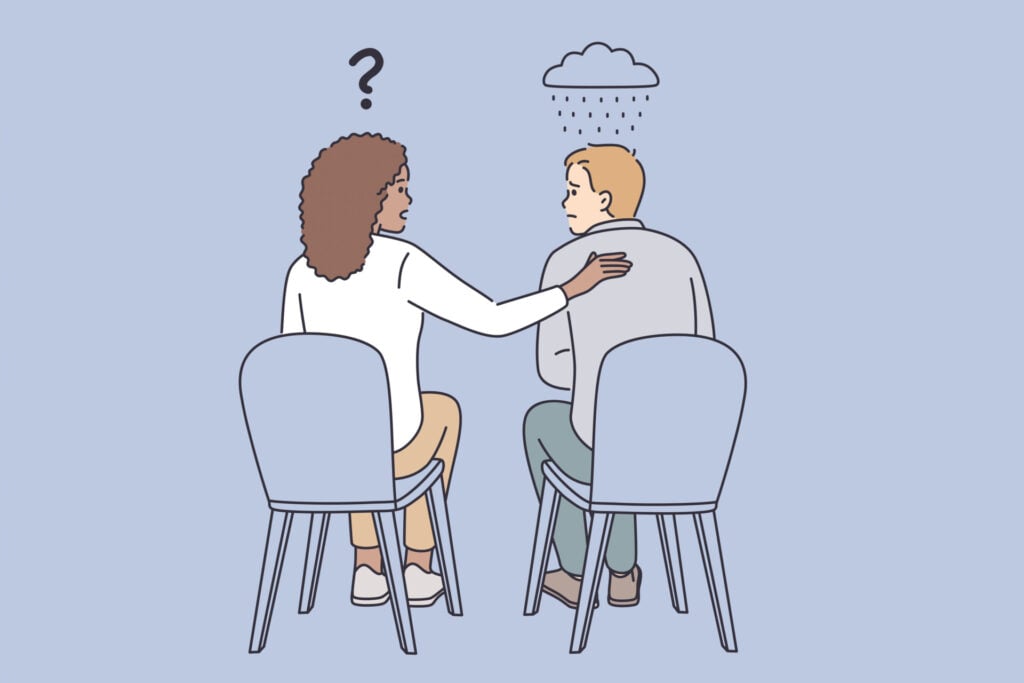 5 Signs You Are Dealing With an Empathic Narcissist 1 two people sat in chairs. man sat in one of the chairs is sad with a rain cloud above his head. the woman is the other chair has a hand on the man's back, consoling him