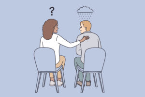 5 Signs You Are Dealing With an Empathic Narcissist 18 two people sat in chairs. man sat in one of the chairs is sad with a rain cloud above his head. the woman is the other chair has a hand on the man's back, consoling him