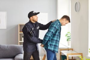 Policeman arrests man