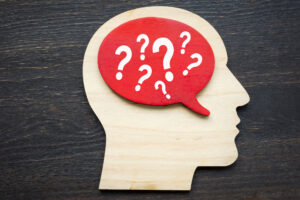 Base Rate Fallacy: Definition, Examples, and Impact 5 question marks in brain