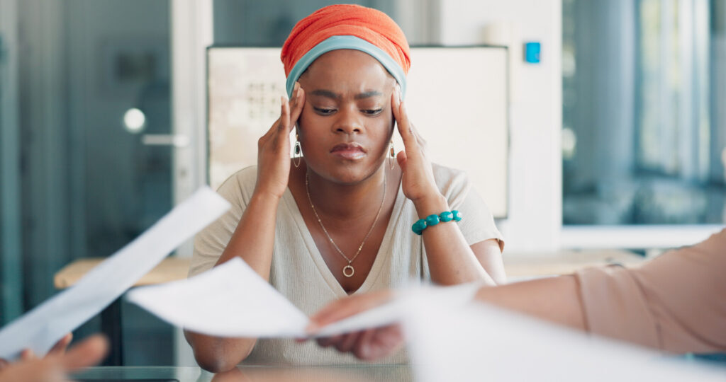 Jobs for People with Social Anxiety 1 a woman in a work meeting looking stressed